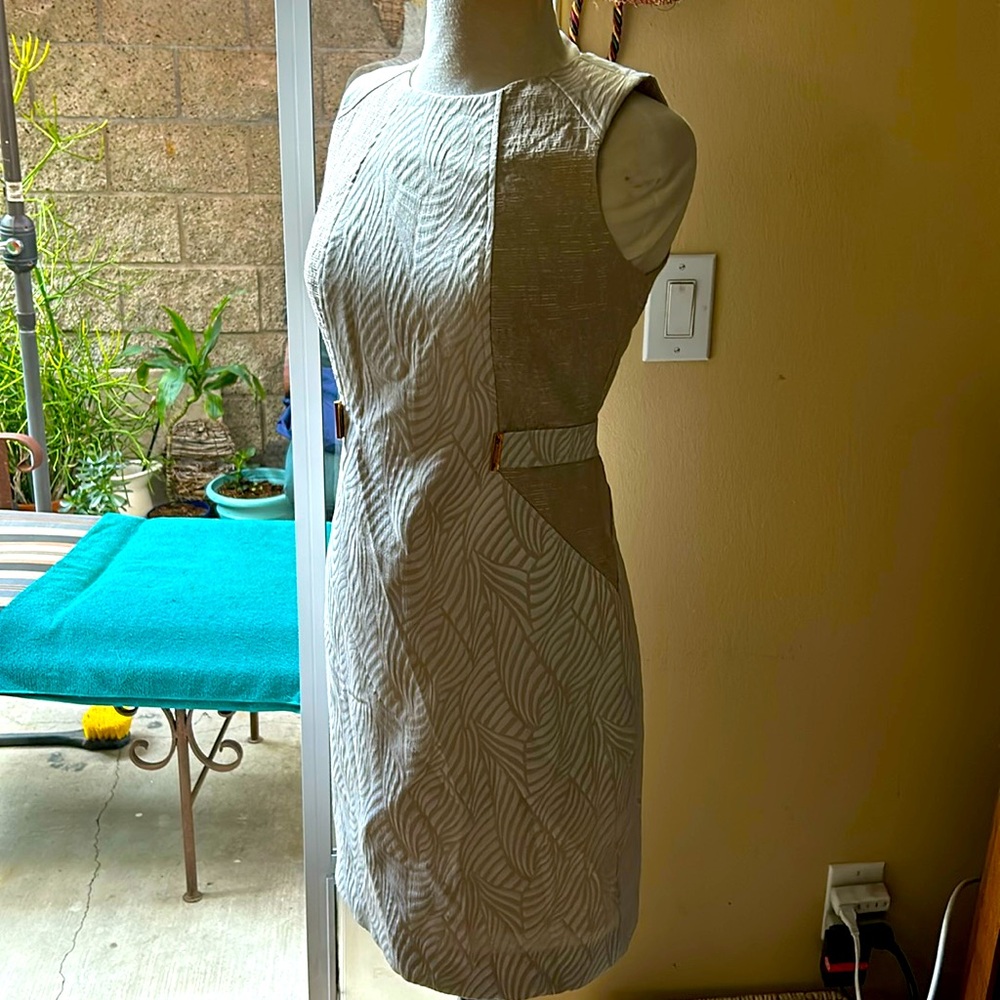 Great details. Calvin Klein dress